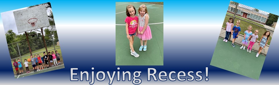 Students playing at recess near the basketball hoop and on the sidewalk