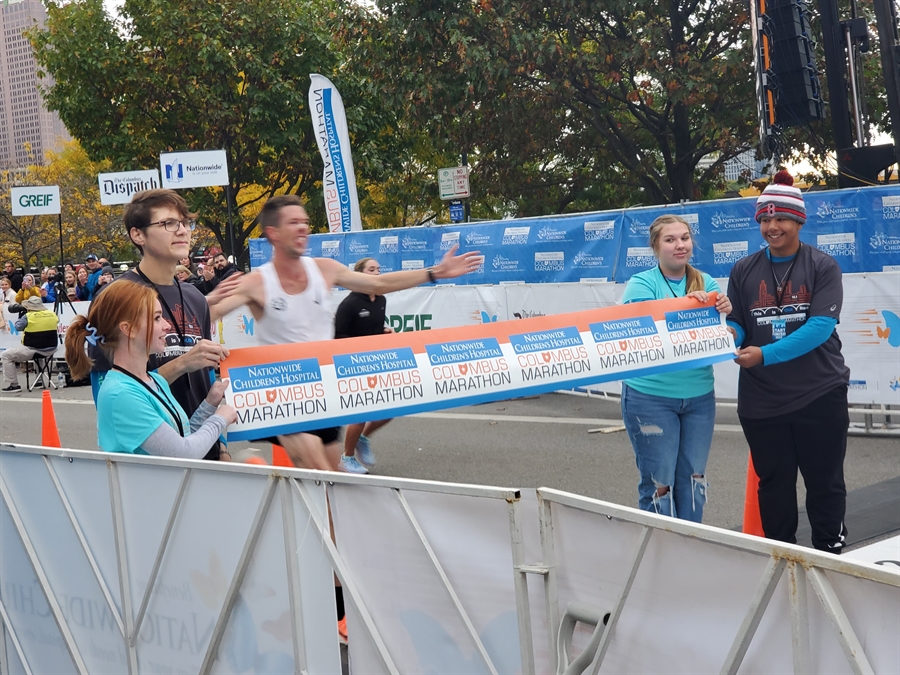 BCS students and staff volunteer at the finish line.