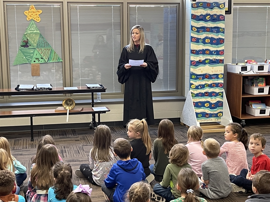 Judge Kennedy speaks to kindergartners. Judge Kennedy speaks to kindergartners.